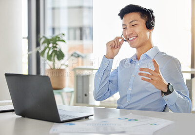 Buy stock photo Customer service, call center and telemarketing with an asian man consultant working on a laptop with a headset. Contact us, crm and consulting with a male working in his sales office with a smile