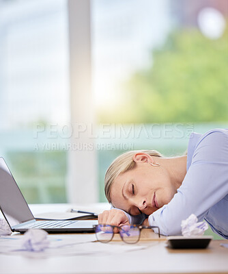 Buy stock photo Sleep, burnout and tired with a business woman sleeping at her desk in the office at work. Mental health, overworked and overtime with a mature female employee lying on her desk with her eyes closed