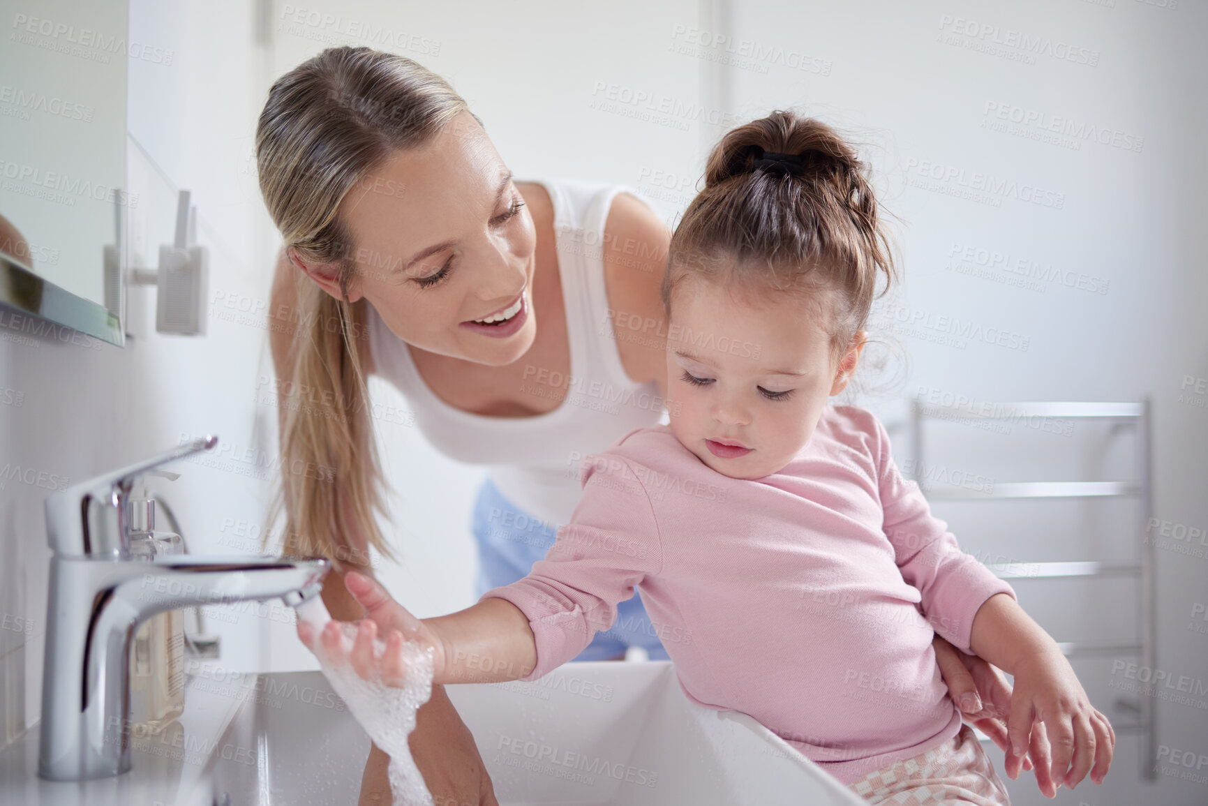 Buy stock photo Bathroom, clean and washing hands with child and mother teaching hygiene with running tap water in basin. Family, health and protection against virus with mom and baby learning a cleaning routine 