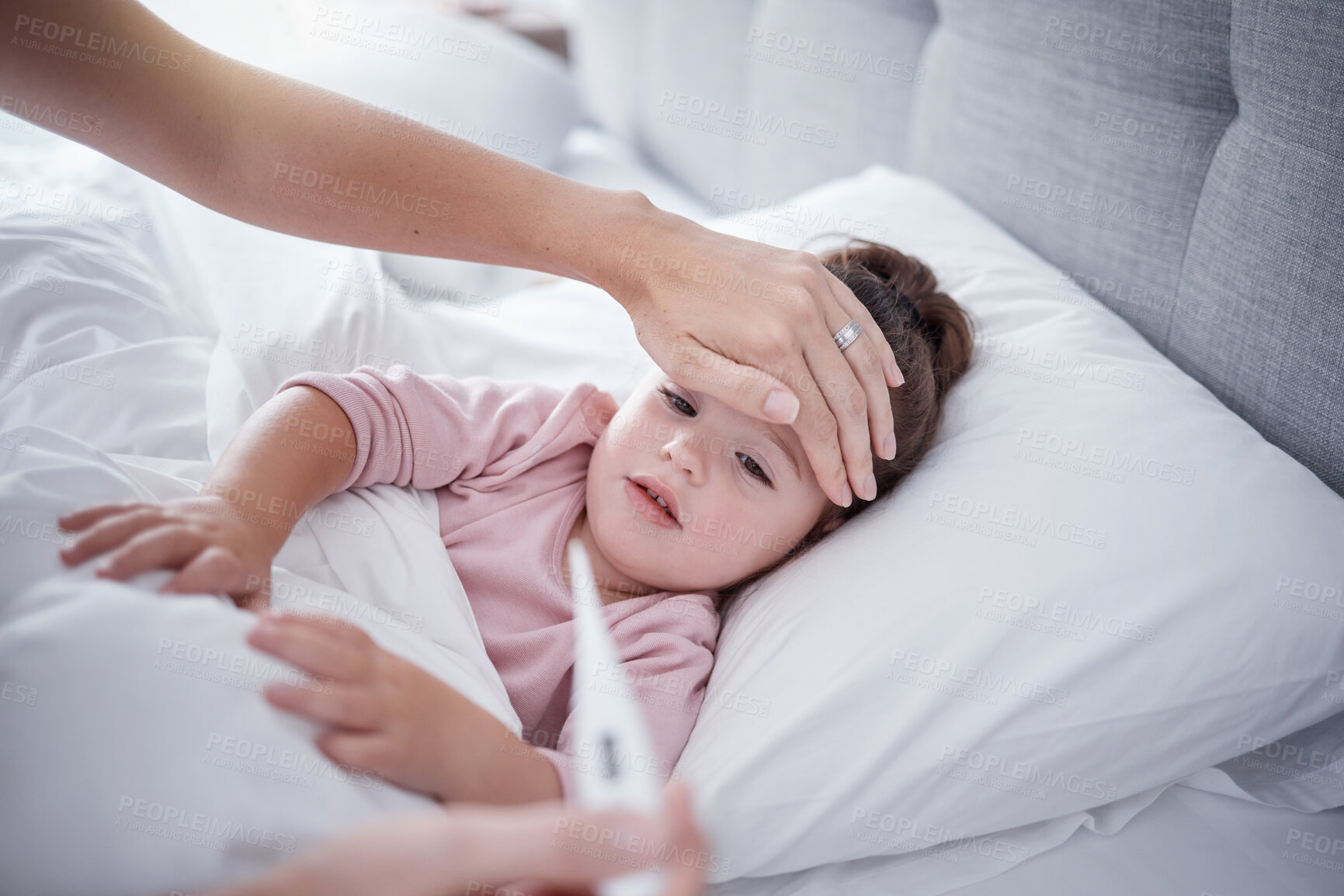 Buy stock photo Sick, virus and fever child bedroom with mother feeling hot forehead, thermometer temperature and healthcare problem test results. Young girl kid resting at home for medical symptoms and covid risk