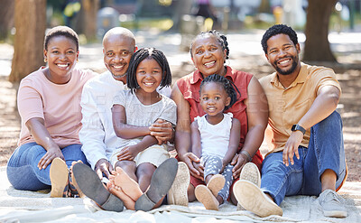 Buy stock photo Love, smile and black family bonding outdoors, relax and happy, having fun on a picnic in a park or forest. Portrait of a big family bonding and enjoying a sunny afternoon together with grandparents