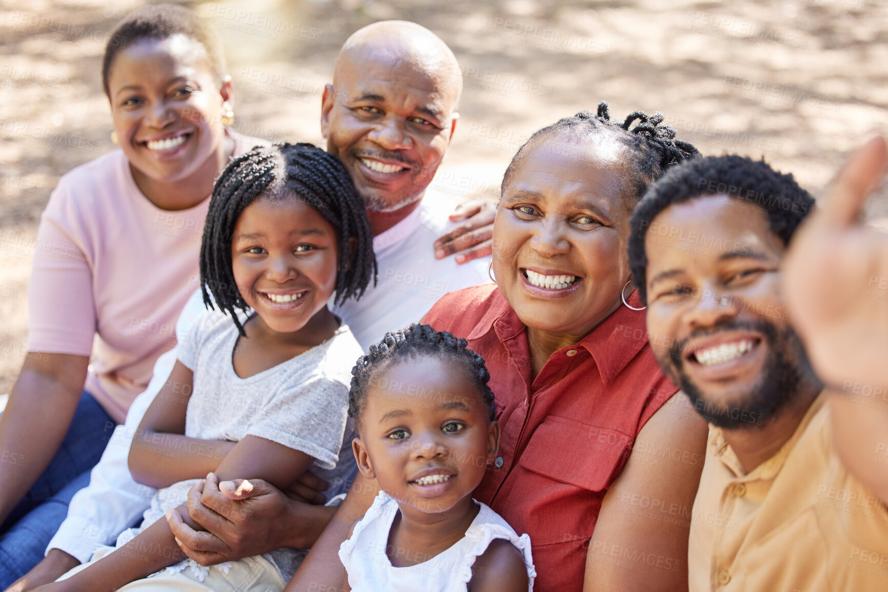 Buy stock photo Black family, selfie and bonding in nature picnic, garden and backyard environment with men, women or children. Portrait, smile or happy kids with senior grandparents, mother and father in photograph