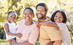 Children, family and love with a black man, woman and their kids outdoor in the park during summer. Happy, smile and parents with a mother, father and daughters as sister siblins outside together