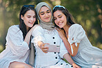 Diversity group of women, friends and selfie in park, garden and outdoor picnic together. Happy, smile and multicultural woman community taking phone photos for social media, fun and summer lifestyle