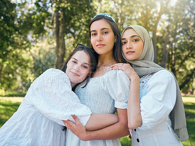 Buy stock photo Group of women hug, show diversity, support and solidarity together, against forrest or garden background. Multicultural friends stand in unity, in outdoor portrait with trees or woods in backdrop