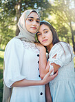 Muslim woman, friends and trust while standing outside in a park and nature with support, love and a good relationship. Portrait middle eastern arab women beautiful in modest Islam fashion with hijab