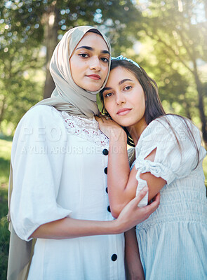 Buy stock photo Muslim woman, friends and trust while standing outside in a park and nature with support, love and a good relationship. Portrait middle eastern arab women beautiful in modest Islam fashion with hijab