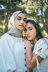 Friends portrait, muslim and woman in park for love, care and women support with hijab or fashion. Islam, Arab, Turkey or Istanbul young people or girl for modest design with garden or nature bokeh