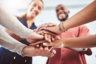Buy stock photo Hand, teamwork and motivation with a business team and their hands in a huddle while standing in a circle in the office together. Collaboration, goal and success with a group of staff in celebration