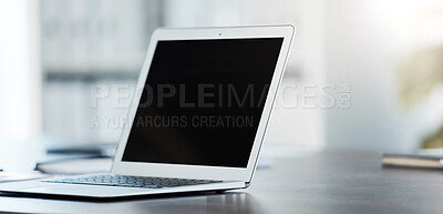 Buy stock photo Digital, laptop and black screen mock up on table surface in office building for marketing, design and frame. Desktop, monitor and online with creative mockup on empty or blank pc display on desk