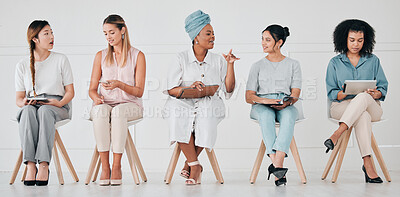 Buy stock photo Hiring, recruitment and interview of business women waiting for company management hire team. Diversity of talking and work communication of group using technology in a office to wait for a meeting