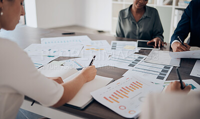 Buy stock photo Hands, writing and finance with a business team in the office during a meeting for planning and accounting. Strategy, teamwork and paperwork with a group of staff working in collaboration with graphs