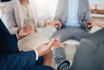 Buy stock photo Business people holding hands in prayer, community trust and support in therapy, workshop and communication for mental health. Depression, anxiety or stress with employees or counseling in circle