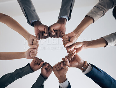 Buy stock photo Team, motivation and support with hands fist bump of corporate partnership office workers. Work community, goal success and collaboration hand sign of business employee group teamwork together