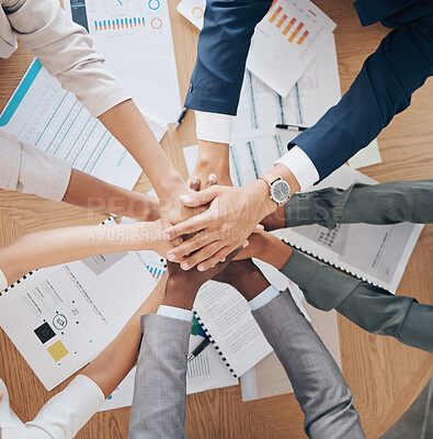 Buy stock photo Office hands work on paperwork together, showing corporate cooperation and healthy community culture to reach business goals. Success is collaboration through teamwork, innovation and positivity