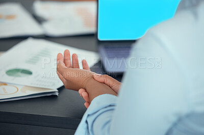 Buy stock photo Injury, hand and business woman with wrist pain while working on a laptop in s corporate office. Arthritis, tender and muscle inflammation by female holding arm in discomfort while typing email
 