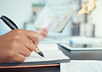 Business woman, hand and notebook writing in marketing planning, target audience research and kpi data analysis in office. Zoom on employee, worker and brand manager with paper documents and schedule