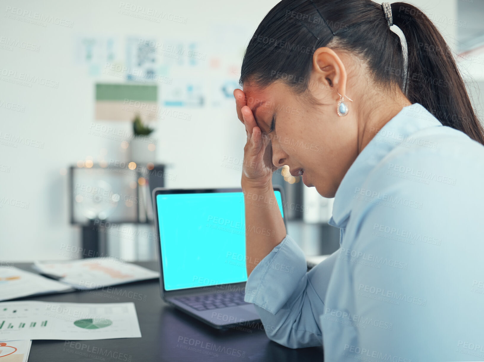 Buy stock photo Anxiety, stress and laptop screen with green screen and mockup in a office at a company desk. Business woman with burnout, headache and mental health problem with work depression or sad in office