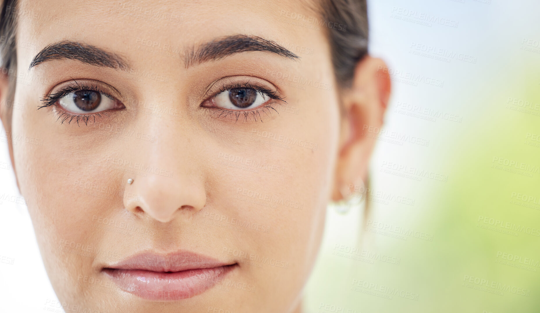 Buy stock photo Beauty, thinking and face of woman with healthy, clean and smooth skin and a nose piercing against a blur background. Portrait attractive Mexican girl standing contemplating while looking focused 