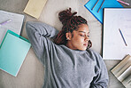 Student, sleeping and burnout with study books on house living room, home interior and bedroom floor. Top view of black woman, fashion designer or art university person tired after education learning