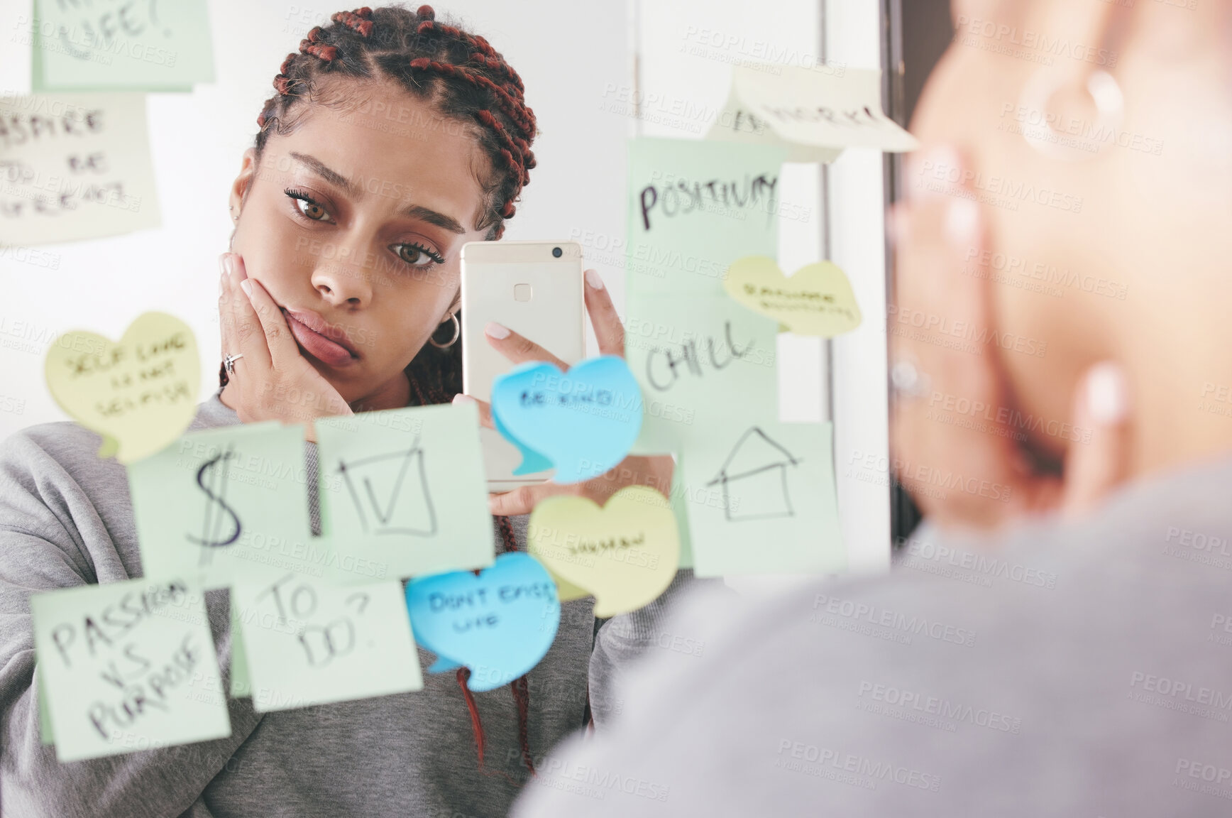 Buy stock photo Sad, depression and anxiety woman selfie with phone and reading sticky notes on a mirror in a room. Upset and unhappy girl reading motivational, positive affirmation and self care post it reminder.