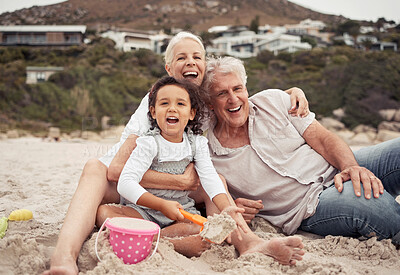 Buy stock photo Family, time and beach with grandparents and grandchild laugh and play in sand, sitting and bonding in nature. Portrait of a happy girl enjoying seaside trip with senior man and woman, relax and fun