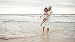 Grandmother, beach fun and child in happy bonding time together outside in nature. Elderly woman holding little girl in playful family bond at the ocean on holiday vacation in the outdoors