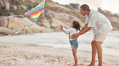 Buy stock photo Father teaching child to fly a kite on beach wind with support, love and care. Helping, learning and fun outdoor with dad and girl kid together on holiday or summer vacation by ocean water and sand