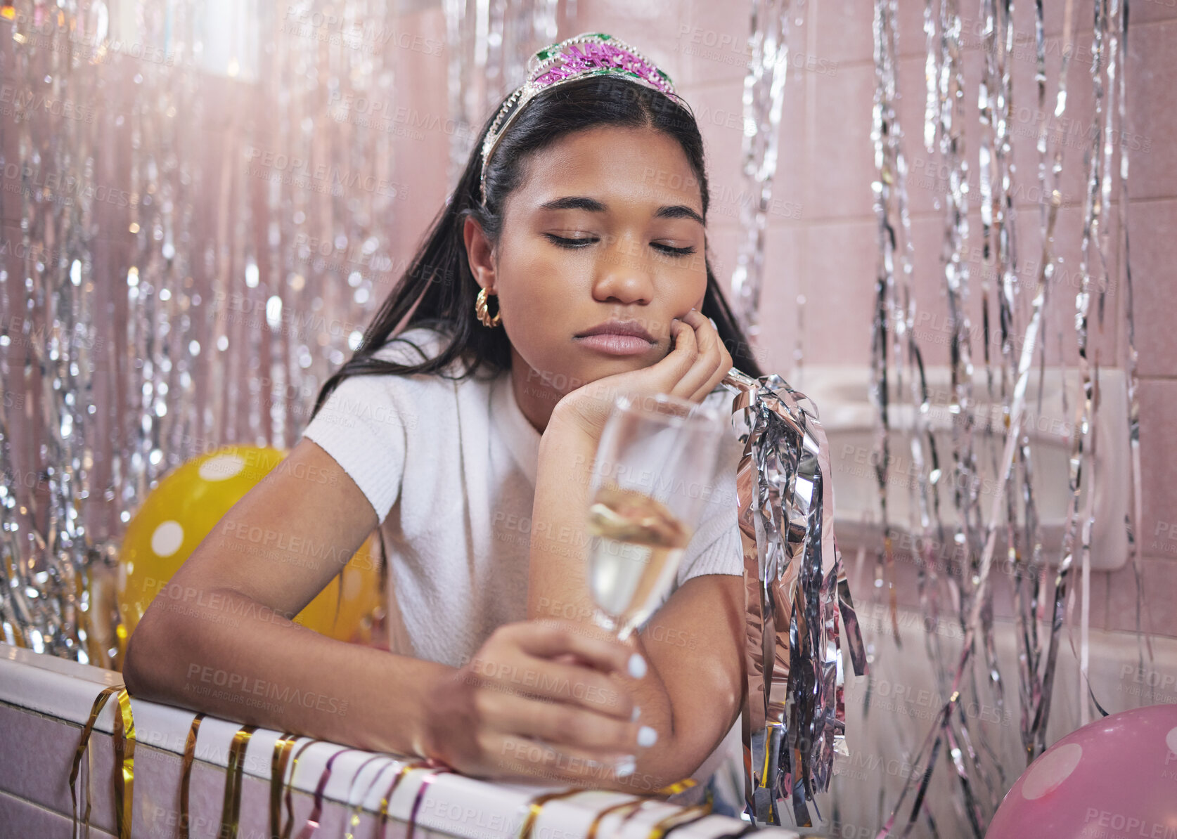 Buy stock photo Birthday girl, sad and champagne while feeling bored, upset and disappointed while sitting alone in bathtub lonely and depressed. Unhappy, boring and abandoned woman during quarantine celebration