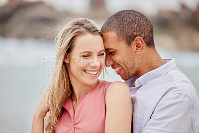 Buy stock photo Love, happy and hug with couple together for romance, relationship and lifestyle on beach holiday trip. Happiness, care and support with man and woman in embrace on summer vacation date by the sea