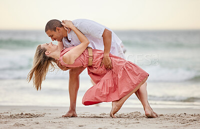 Buy stock photo Love, dance and couple dancing at the beach in summer celebrate their marriage, happiness and honeymoon vacation. Smile, sunset and happy woman celebrating a healthy relationship with partner at sea