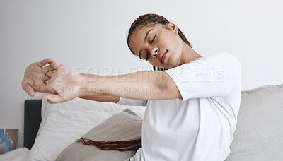 Buy stock photo Health, wellness and zen, woman stretching on bed in the morning to start new day. Motivation to get up, young student stretching before going to school. Mental preparation in the bedroom to wake up.