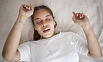 Relax, sleep and bed with woman listening to music while sleeping in her bedroom from above. Radio, podcast and meditation frequency sounds with female using relaxation streaming to help relaxation