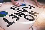Hands of earth protest writing on cardboard woman support environment sustainability, clean energy and climate change Woman with banner for planet co2 global warming solution and  eco friendly rally