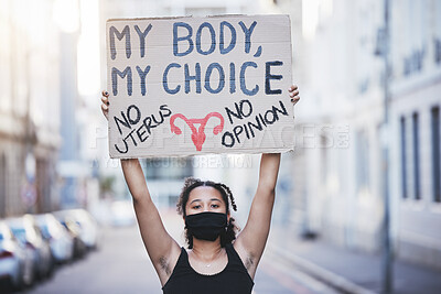 Buy stock photo Freedom, protest and abortion with a woman and a poster, fighting for human rights and gender equality. Justice, change and banner in the hands of a young female marching for social justice