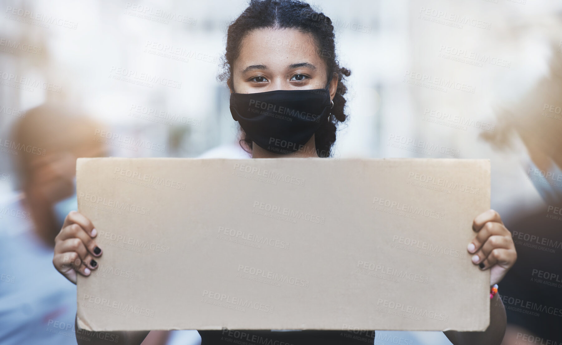 Buy stock photo Activism, protest and girl with a poster with copy space in a street with face mask during pandemic. Portrait of human rights activist protesting with a empty sign for equality or justice in the city