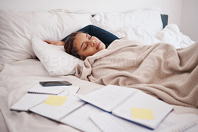 Buy stock photo Tired, burnout and sleeping scholarship student in bed after study or research with books. Woman sleep, rest or fatigue while studying or learning for test or exam with notebook in bedroom 