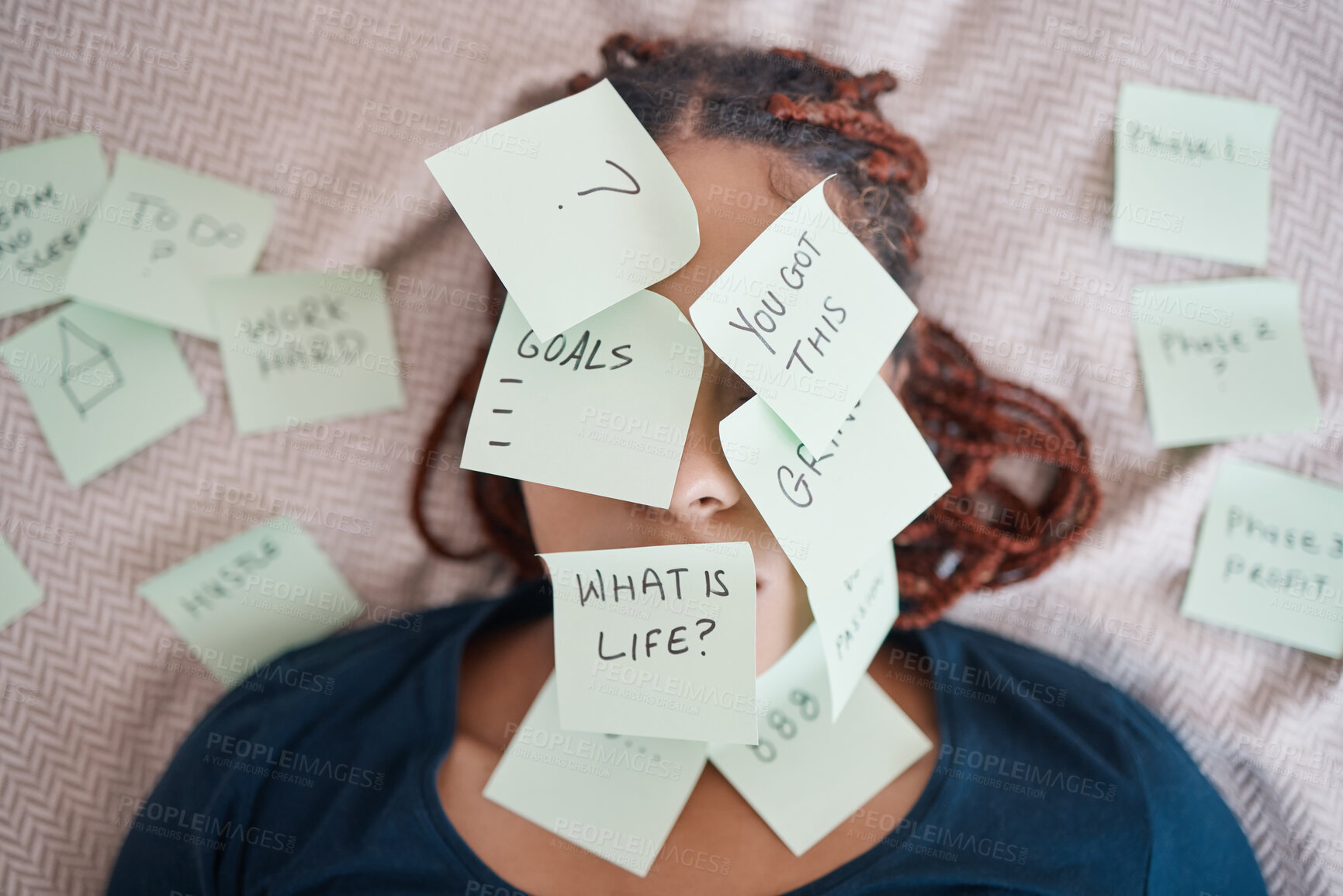 Buy stock photo Black woman on bed, sticky note on face for motivation and success in life. African lady in bedroom, stick paper with questions on skin and eyes, planning strategy, for career and personal goals