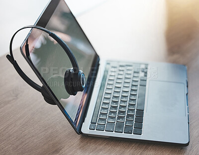 Buy stock photo Laptop, headphones and call center telemarketing background on desk in office for contact us, video call and virtual online consulting. Zoom of customer support technology for internet communication