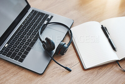 Buy stock photo Laptop, notebook and headphones for call center, customer service and crm consulting in empty contact us office. Zoom on communication technology for internet webinar, training and education workshop