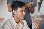 Success, motivation and winning hand sign with business people victory celebration in an office together. Asian man closeup of happy expression, feeling like a winner after good feedback or proposal