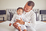 Happy baby and father relax in a bedroom portrait for love, support and child care. Excited, happiness of dad person holding newborn girl, child or kid bonding together for healthy growth development