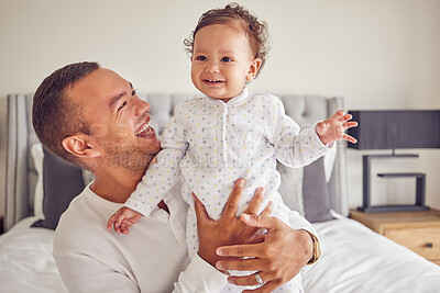 Buy stock photo A happy dad and baby with smile on the bed at home, having fun and laughing together. Portrait of man bonding, smiling and playing with kid in bedroom. Family, love and care from father