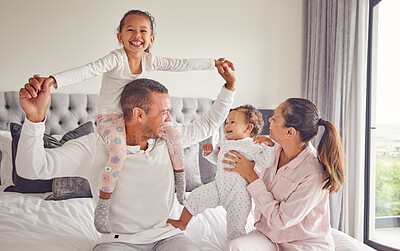 Buy stock photo Comic family, happy and bedroom portrait while relax in home together, smile for parents love and international hotel holiday. Excited kids with mother and father on holiday and being playful in bed