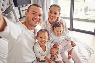 Buy stock photo Selfie, family and children with a mother, father and their girl kids sitting on a bed in their home. Daughter, sister and parents with a man taking a picture while relaxing in a bedroom of the house