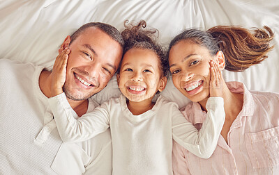 Buy stock photo Happy, family and bed of people smile with above view in a bedroom with happiness at home. Portrait of a mother, girl and man from Spain spending quality time together with love and care at a house