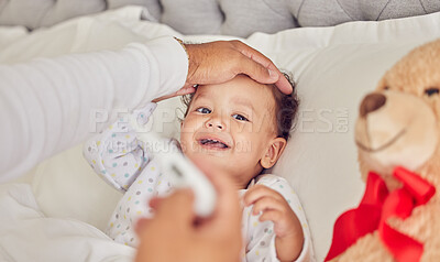 Buy stock photo Baby, sick and fever with a mother checking the temperature of a girl lying in bed at home. Family, healthcare and medicine with a daughter feeling ill or unwell and resting in the bedroom of a house
