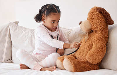 Buy stock photo Stethoscope, teddy bear and girl in bed for heartbeat in  hospital doctor or nurse game play of love, support and care. Young child learning, test and check medical heartbeat health exam on baby toy 