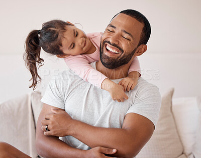 Buy stock photo Family hug, happy love and father with smile for child on sofa in home, care for kid and excited about weekend together in the living room. Girl hugging dad while relax on couch in the lounge