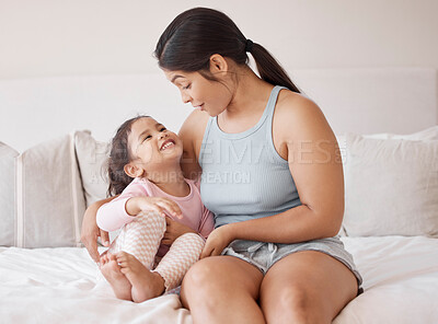 Buy stock photo Happy mother in bedroom has fun with child, bonding together in bed at home while they smile and hug. Family, love and happiness when you have a kid are good for a healthy childhood life growing up